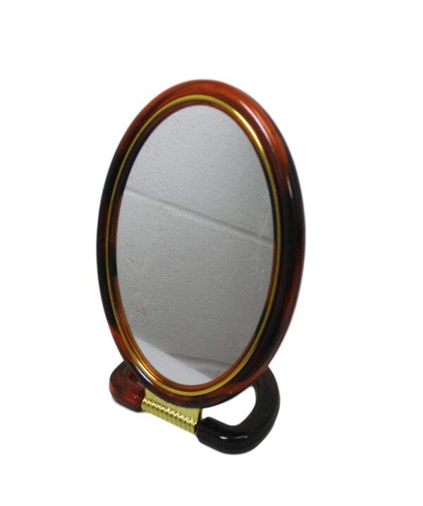 A double-sided oval desk mirror with a stand measuring 22 cm is a versatile and practical accessory for personal grooming or makeup application. The mirror typically features...