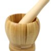 A traditional wooden household kitchen spice grinder is a small, manual tool used for grinding spices. The dimensions provided, 9cm x 10cm, suggest that it is compact and...