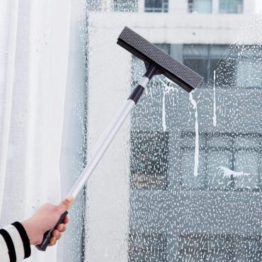 **Dual Functionality**: The tool has both a squeegee and a sponge. The squeegee is typically used for wiping away water and cleaning solutions from glass surfaces, leaving them...