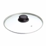 It seems like you are referring to a replacement glass pan lid with a knob, specifically a 28 cm clear glass lid. The product code or model number appears to be "0788 A." This...