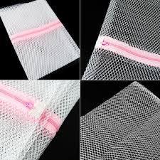 **Material**: The bag is typically made from a durable mesh material that allows water and detergent to flow through while protecting the contents from damage