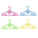The "4 Pack Fancy Floral Plastic Clothing Hangers 43cm 2918" refers to a set of four clothing hangers, each measuring 43 centimeters in width. These hangers are made of plastic...