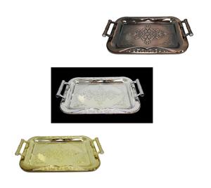 The description appears to refer to a vintage serving tray made of metallic chrome steel, measuring 37 x 54 cm. The tray is available in assorted colors, and the product code or...