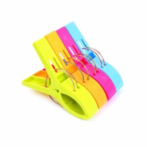 The description "Plastic Large Washing Clothing Pegs with Spring 15 cm Pack of 4 0449 (Parcel Rate)" refers to a set of laundry pegs. These pegs are made of plastic and are...