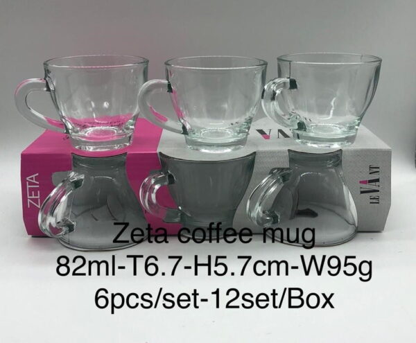 The description refers to a set of six Zeta coffee mugs. Each mug has a capacity of 82 milliliters. The dimensions are given as a top diameter of 6.7 cm and a height of 5.7 cm....