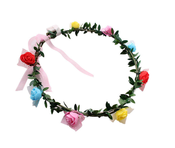 The "Multicoloured Light Up Plastic Flower Crown Wreath" is a decorative accessory designed to be worn as a crown on the head. It features foam flowers and measures 17 cm in...