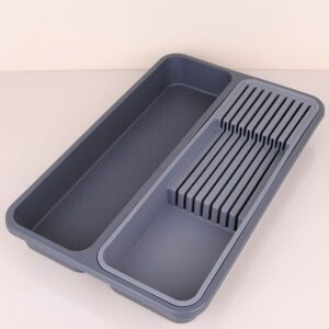 The Plastic Kitchen Cutlery Drawer Organiser with Knife Holding Slits is a practical kitchen accessory designed to keep your cutlery and knives neatly organized. The model...