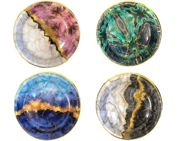 The product you're describing is a round plastic tray featuring a printed geode pattern design. It measures 29 cm in diameter and 3.5 cm in height. The tray comes in assorted...