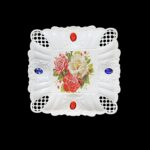 The product you're describing sounds like a decorative serving tray made of plastic with a printed design and embellished with jewels. The tray has a diameter of 22 cm and is...