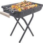 The "Small BBQ With Metal Stand GN236" seems to be a compact barbecue grill that likely comes with a sturdy metal stand for support. Given its designation as a "Big Parcel...