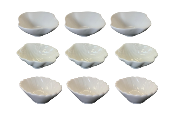 This product appears to be a set of small porcelain appetizer sauce dish bowls, each measuring 7 cm in diameter. The set includes three bowls with assorted designs. The product...