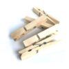 This product refers to a pack of wooden cloth laundry pegs, each measuring 9.5 cm in length. The pack contains 12 pegs. The numbers "0372 / 7064" might be product or stock codes...