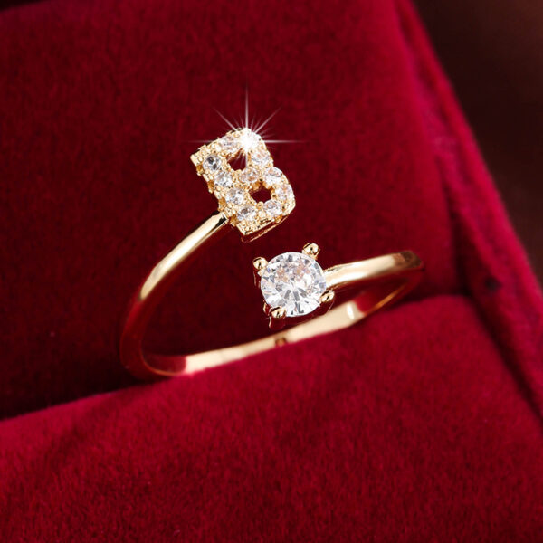 Adjustable Copper Ring With Four-claw Round Zirconia, Featuring The 26 English Letters Of Fashion Trend. - Image 13