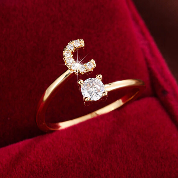 Adjustable Copper Ring With Four-claw Round Zirconia, Featuring The 26 English Letters Of Fashion Trend. - Image 15