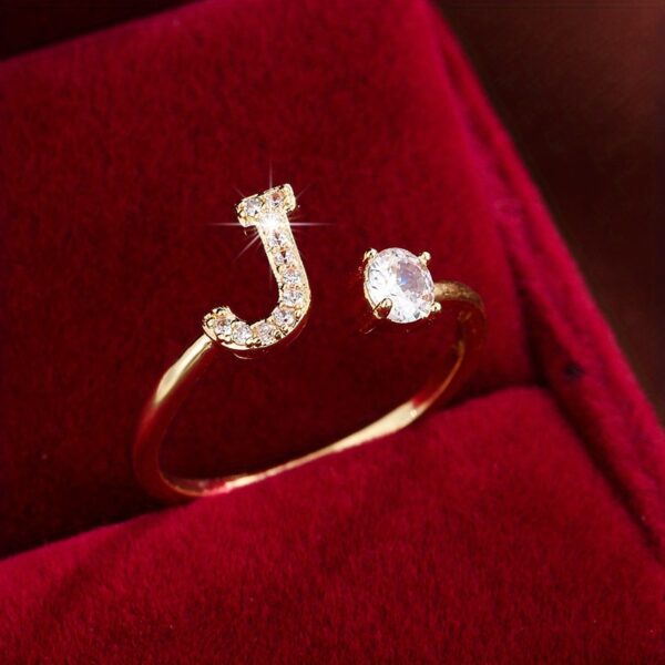 Adjustable Copper Ring With Four-claw Round Zirconia, Featuring The 26 English Letters Of Fashion Trend. - Image 24