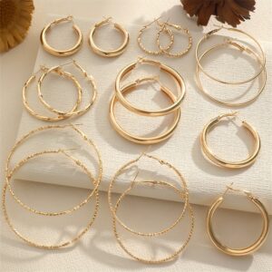 A Set Of 8 Pairs Of Simple And Stylish Twisted Wave Sparkling Earrings In Golden And Silvery Colors.