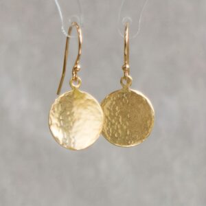 A Pair Of Minimalist Golden Concave And Convex Small Round Earrings For Women, With A Simple And Elegant Geometric Circular Design In European And American Style.
